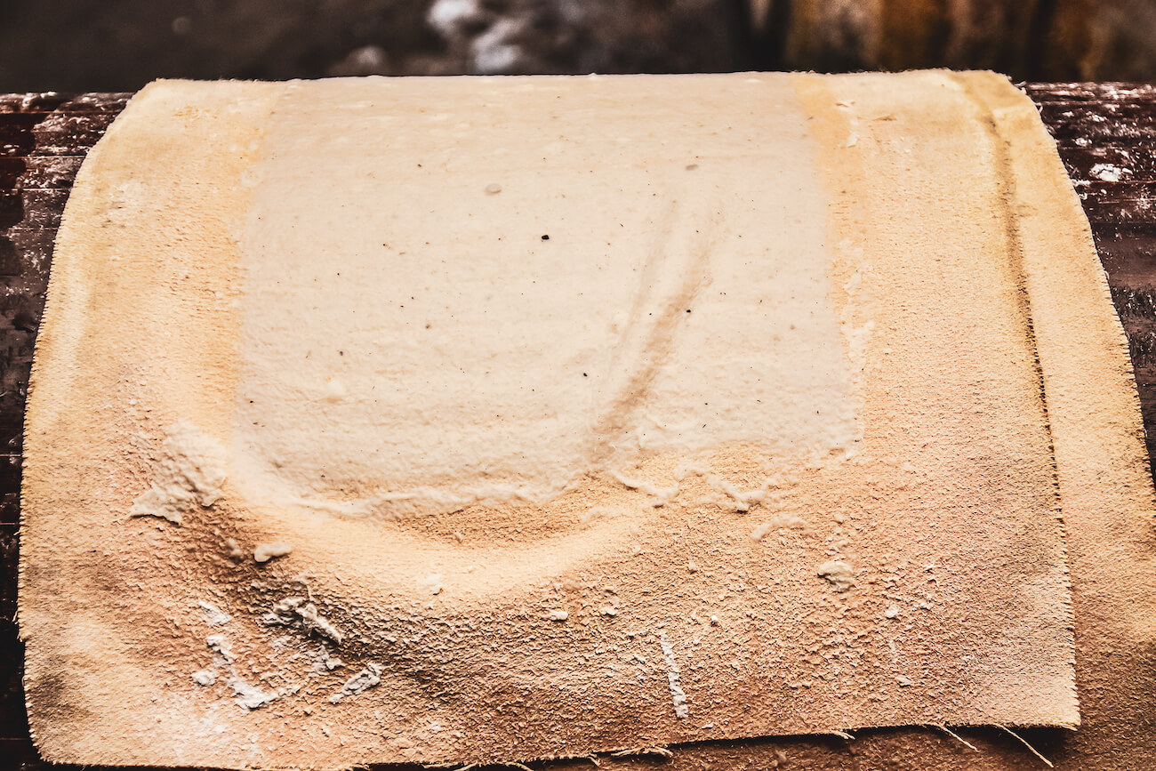 Cellulose pulp on an old canvas for paper production