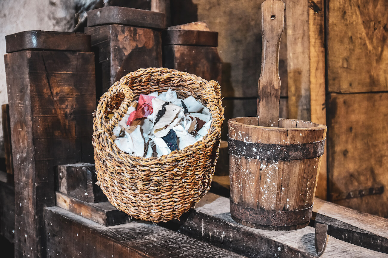 Torn rags in a wicker basket